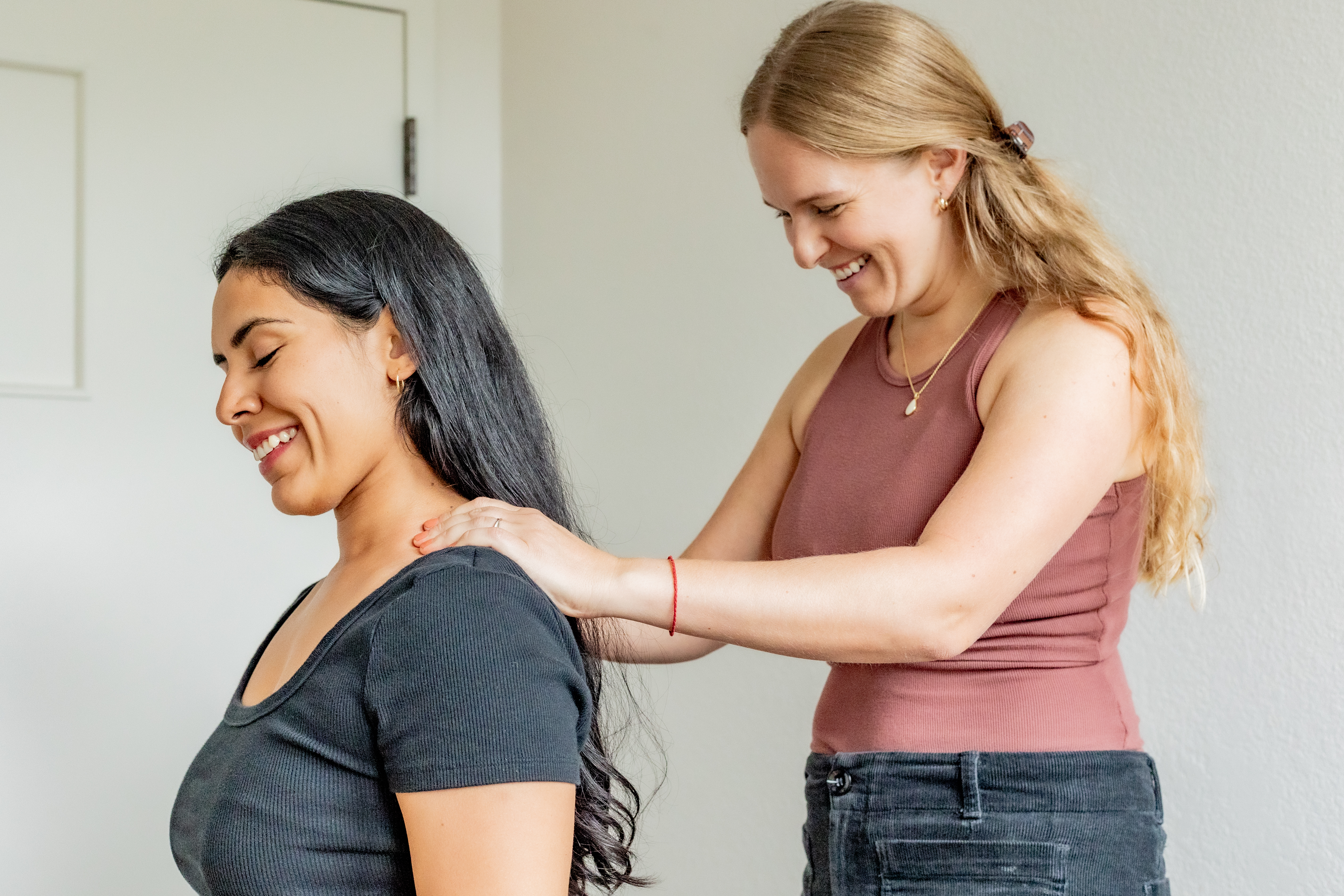 Dr. Laura Barnum providing hands-on chiropractic care to a patient